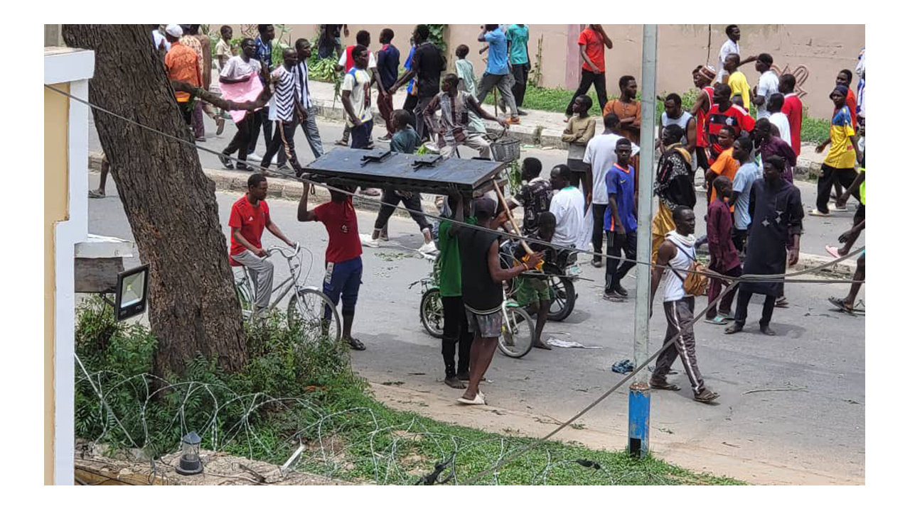 Rioters-Storm-Rampage-Loot-Furniture,-Mattress,-and-Others-At-NCC-Kano.png